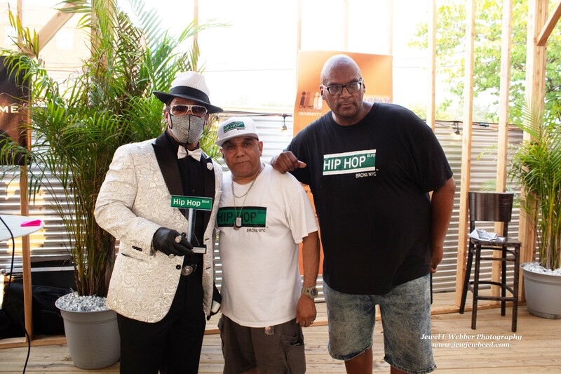 Grandmaster Melle Mel poses holding his award with Al Pizarro, Co-founder of Hip-Hop BLVD NYC and Big Jeff