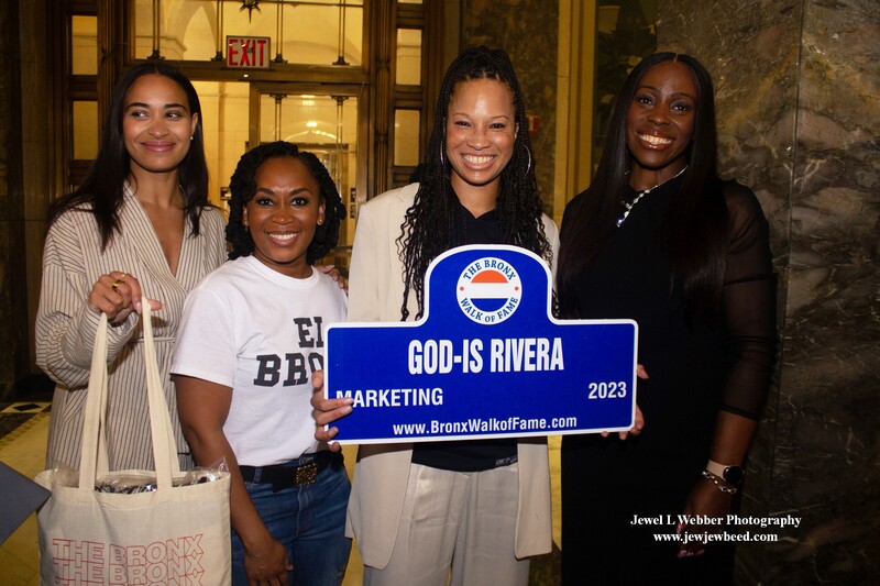 Group photo with Janet A. Peguero, Bronx Deputy Borough President; Sulma Arzu-Brown, Executive Director of the Bronx Tourism Council; Bronx Hall of Fame Inductee, God-Is Rivera the VP of Inclusive Marketing at Disney Entertainment and Bronx Borough President Vanessa L. Gibson. God-Is Rivera is the Vice-President of Inclusive Marketing at Disney Media & Entertainment Distribution. photo by Jewel Webber